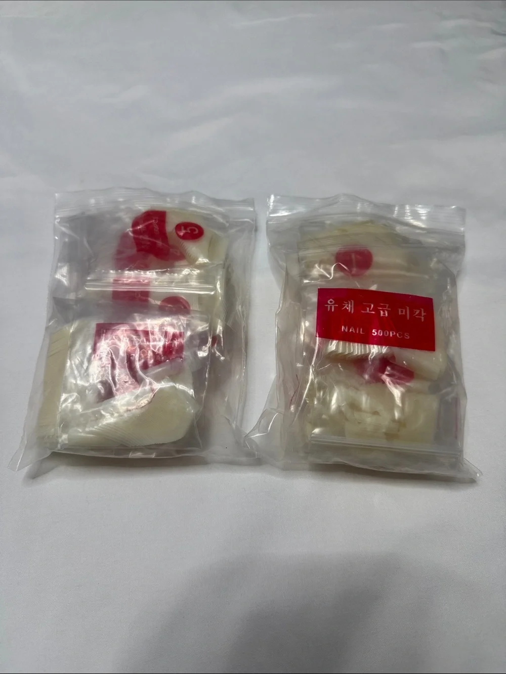 Set of 2 packs 500 pieces each packsClear Press-On Nail Tips Set - Natural Ivory